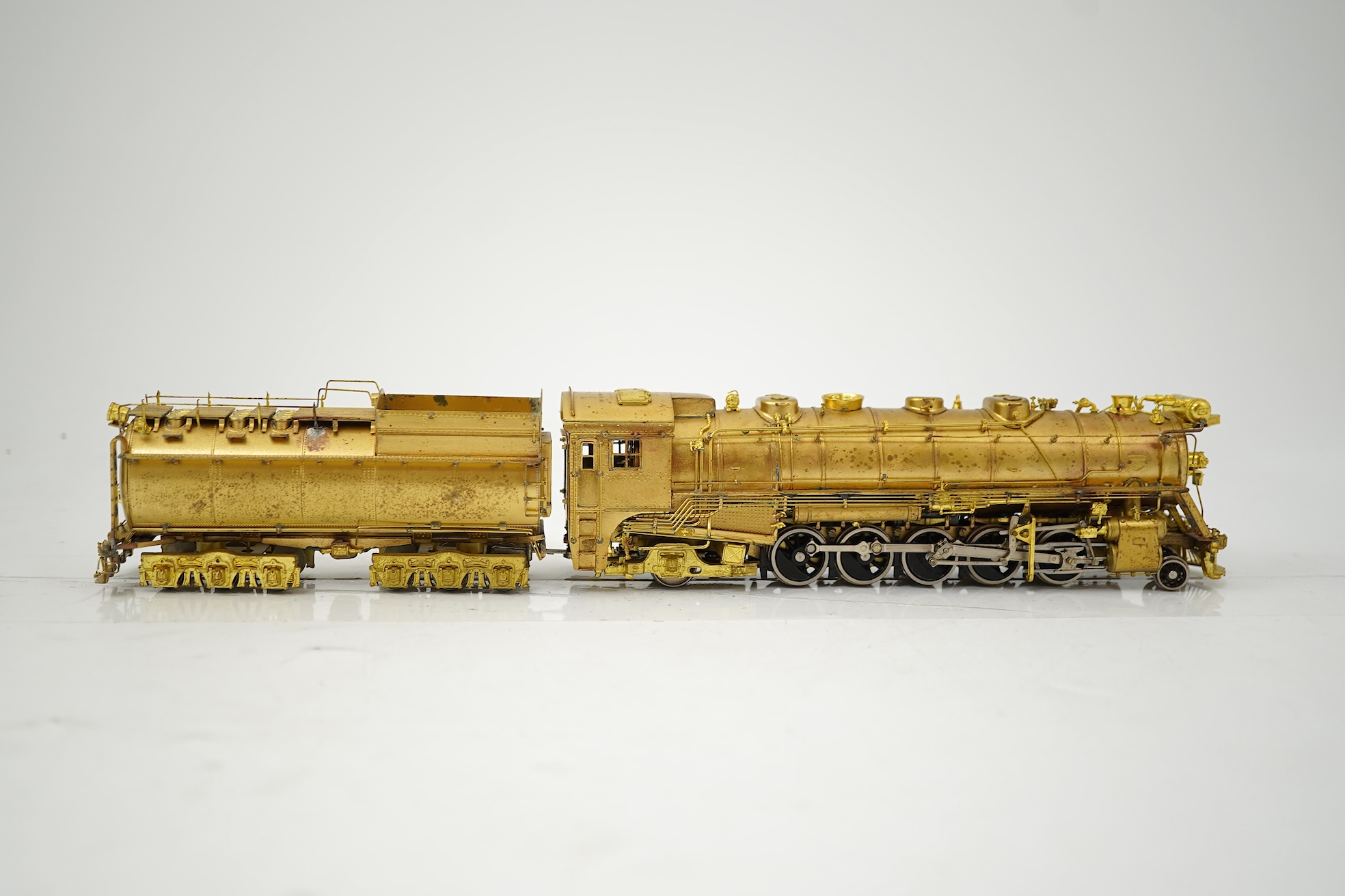 A boxed HO gauge VH Scale Models unpainted brass model of Canadian National Railways T-2a, 4100, 2-10-2 locomotive with bogie tender, powered for two rail operation.